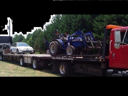 Tractor shipping and hauling service